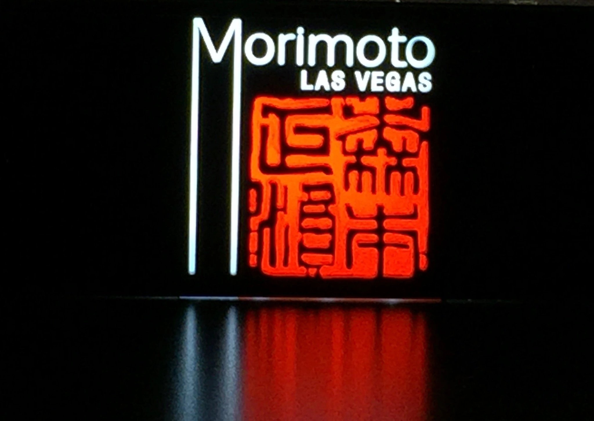 laser cutting Morimoto Logo in LED